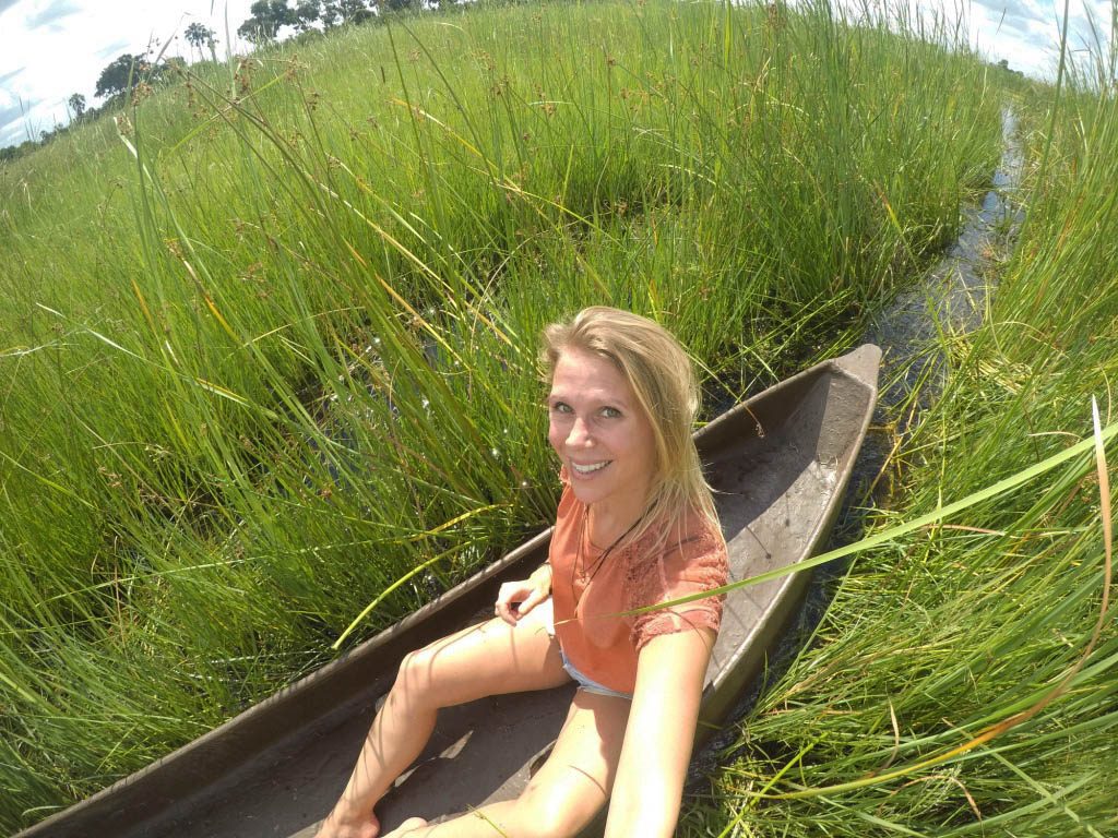selfie in the mokoro boat between the high green grass